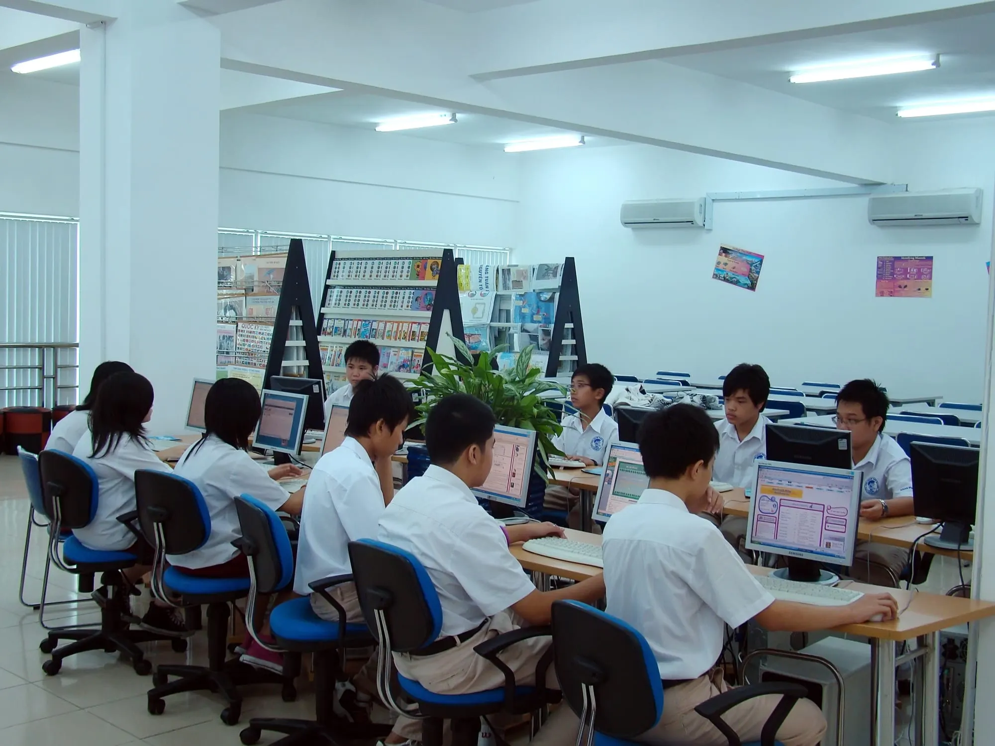 Students using computers in a school e-library